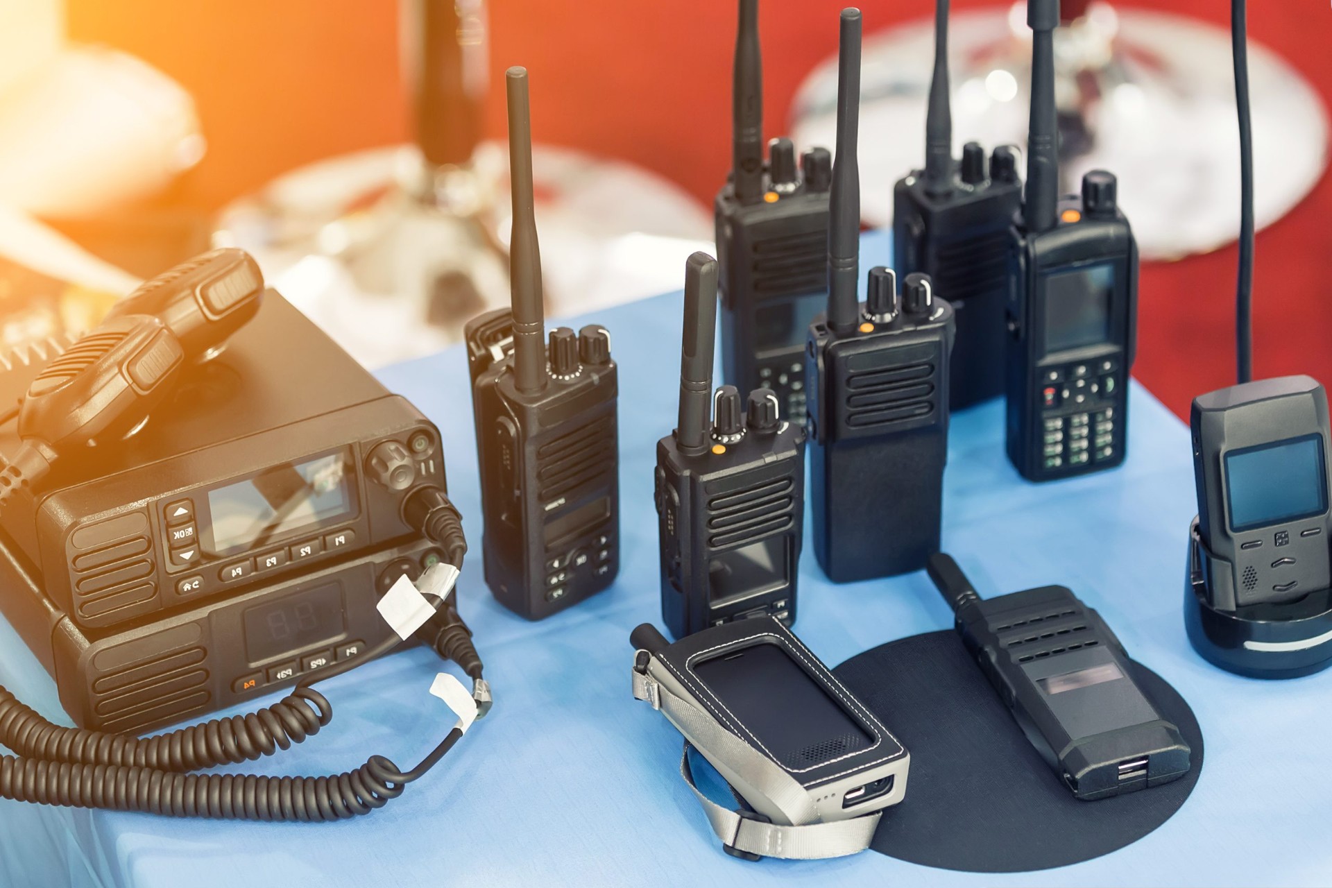 Public-safety radio fleet including mobile and portable units on a dispatch table